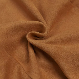 Caramel suede fabric detail of asymmetrical fringe dress