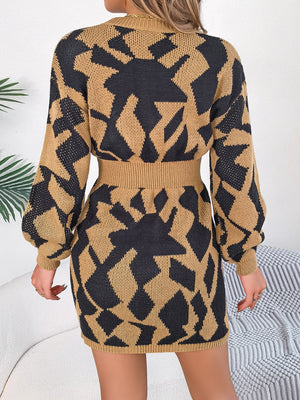 Knit mini dress in khaki with black geometric pattern, long sleeves, and belted waist.