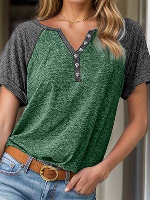 Green and gray raglan sleeve henley tee with button detail and rolled cuffs.