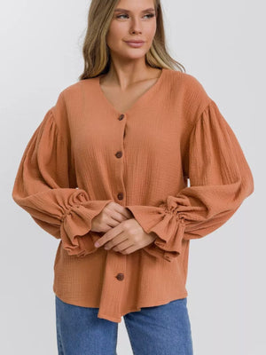 Ochre textured blouse with puff sleeves and ruffled cuffs
