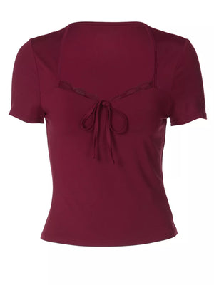 Wine red tie-front t-shirt with lace trim and square neckline.