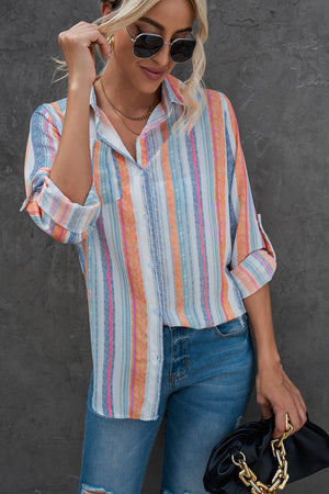 Coastal Stripe Button-Down Blouse in orange and blue with rolled sleeves.