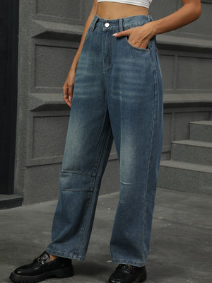 Relaxed fit denim trousers in medium wash with patchwork knee detail.