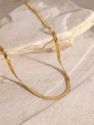 Gold serpentine layered necklace with adjustable length