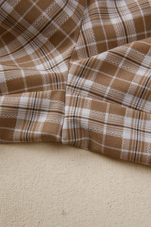 Plaid print casual pants in camel and white with drawstring detail.