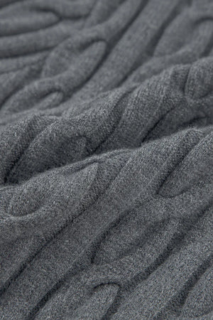 Dark gray cable knit sweater with textured detail