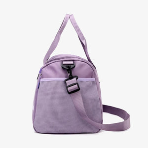 Mauve nylon duffle bag with mesh pocket and adjustable strap
