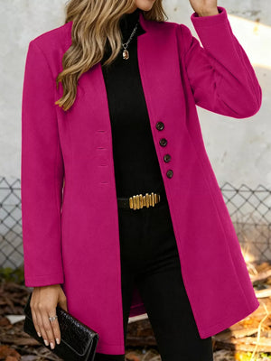 Chic longline trench coat in Deep Rose with button-down front and collarless neckline.