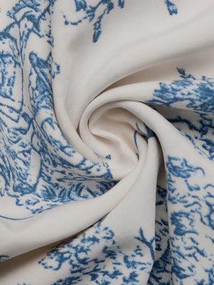 Toile print midi dress in blue and white with a V-neck.