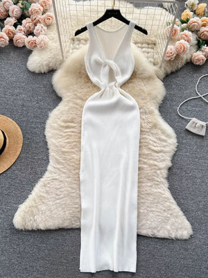 White ribbed knit midi dress with knot-back cutout detail