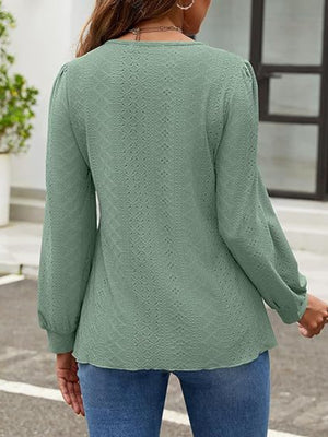 Sage perforated puff sleeve blouse with textured pattern