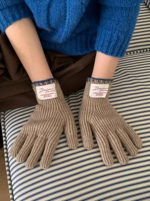 Brown ribbed knit gloves with scalloped cuff and Bonjour label detail