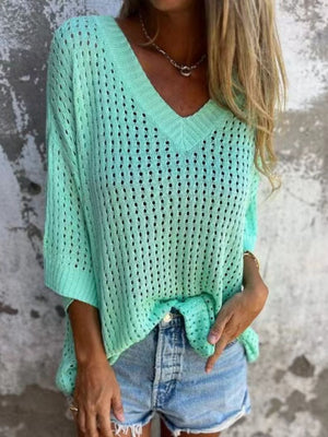 Open-knit V-neck sweater in Tiffany Blue with slouchy fit and elbow-length sleeves.