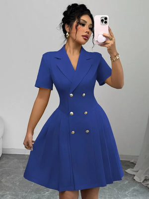 Blue double-breasted pleated blazer dress with gold buttons and short sleeves.