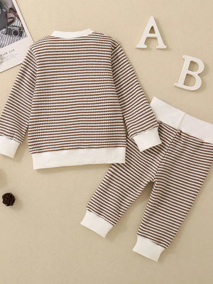 Baby knit set with brown and white stripes, long sleeves, and ribbed cuffs and hem.