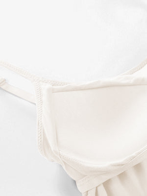 Ivory soft-cup cami with adjustable straps and a seamless neckline.
