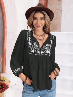 Black embroidered yoke blouse with gathered bodice and tie neck