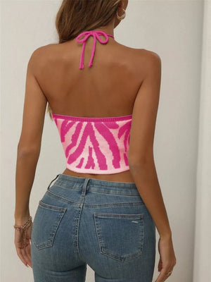 Zebra-striped halter knit cami in hot pink with tie-back detail.