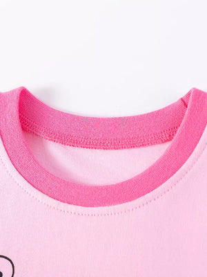 Children's pink short sleeve top with contrast pink neckline and ladybug graphic detail.