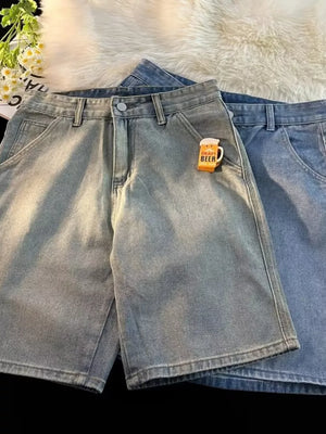 Men's light wash high-waisted wide-leg denim shorts with a beer mug charm.