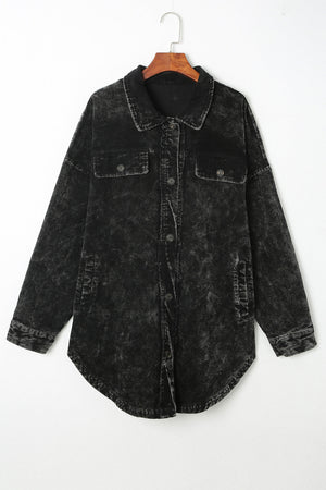 Black textured corduroy overshirt with faded wash, button front and chest pockets.