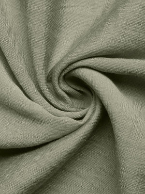 Elegant Smocked Waist Maxi Dress fabric detail in sage green linen blend with subtle texture.