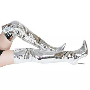 Silver thigh-high stiletto boots with pointed toe and side zipper detail.