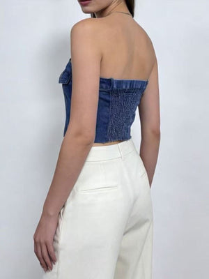 Blue denim strapless top with smocked back and flap pockets