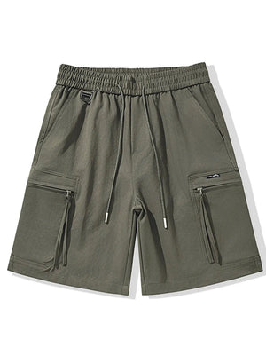 Men's military green cargo shorts with elastic waist, drawstring, and zippered pockets.