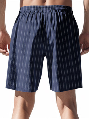 Navy pinstripe chino shorts with drawstring waist and elastic waistband.