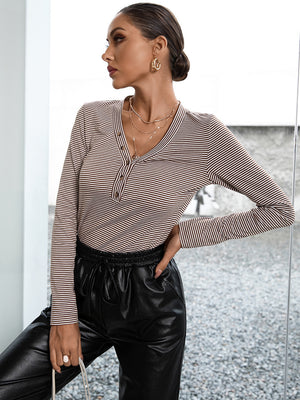 Ribbed henley stripe top with button detail and long sleeves.