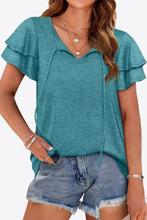 Tiered sleeve keyhole blouse in Air Force Blue with tie detail.
