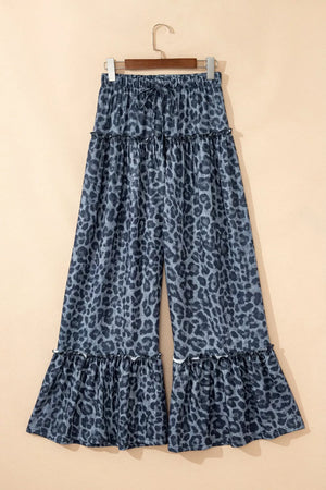 Maternity leopard print wide-leg pants in dark navy with ruffled tiers and a drawstring waist.
