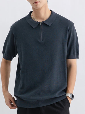Textured knit zip-up polo shirt in dark gray with short sleeves and a spread collar.