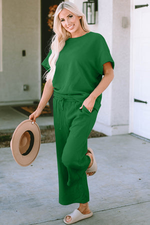 Green textured knit tee and wide leg pants set with drawstring waist.