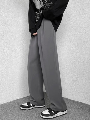 Grey wide-leg casual pants with a relaxed fit and clean finish