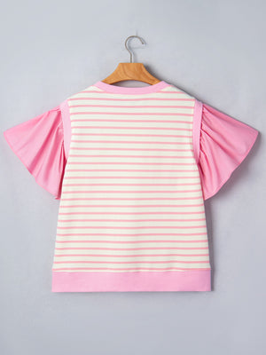 Ruffled short-sleeve blouse with pink and white stripes and solid pink sleeves.