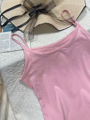 Pink scoop neck cami with spaghetti straps, part of a set.