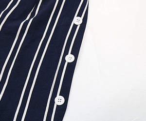 Dark blue vertical stripe palazzo trousers with white button detail