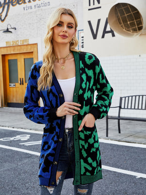 Colorblock leopard knit duster cardigan with button front and pockets.