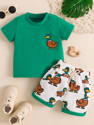 Green baby tee with duck graphic and matching duck print shorts set