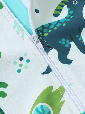 Children's swimwear set with whale print in turquoise, emerald, and cyan.