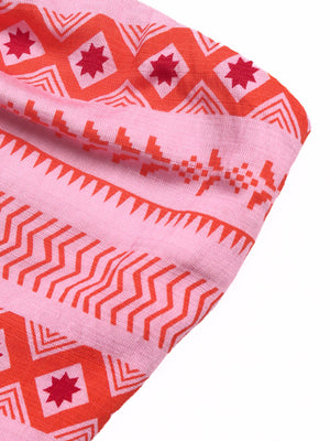 Pink midi dress with red geometric pattern, halter neck detail