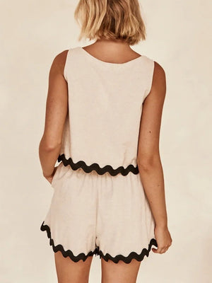 Tan linen tank top and shorts set with black scalloped trim detail.