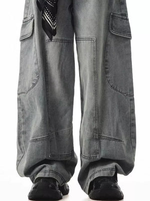 Relaxed fit grey cargo jeans with spacious pockets and a black bandana detail.