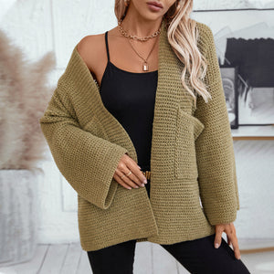 Chunky knit open front cardigan in moss with wide sleeves and a relaxed fit.