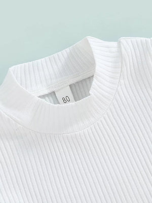 White ribbed knit baby top with mock neck detail
