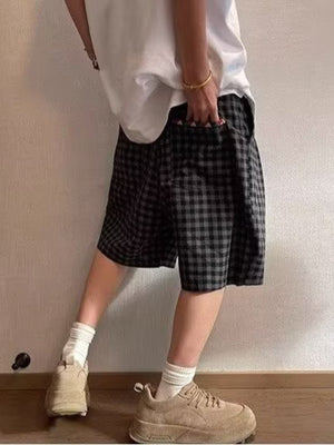 Men's dark gray plaid drawstring shorts with pockets