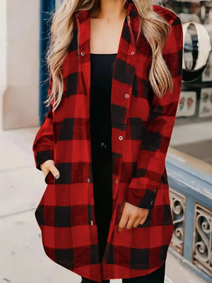 Oversized buffalo check shirt jacket in deep red and black, with snap buttons and pockets.