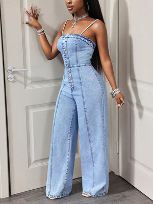 Light wash denim jumpsuit with button-down front and wide legs.